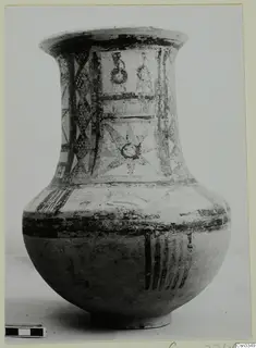 Bichrome wheel-made pottery jar with a flaring rim and painted geometric designs