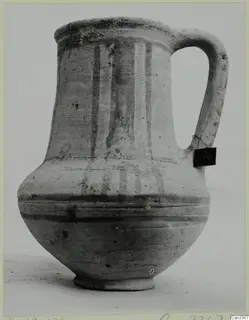 Pottery Bichrome Wheel-made jug from Enkomi, with dark painted bands on a pale body