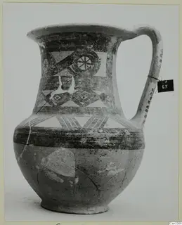 Bichrome wheel-made jug from Heurltey with painted triangles, diamonds and a rosette motif