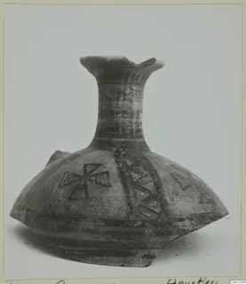 Painted pottery vessel with a tall flaring neck and dark geometric bands
