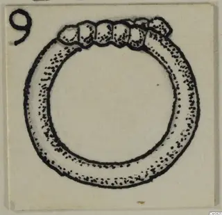 Drawing of a ring with a row of segments across its upper edge