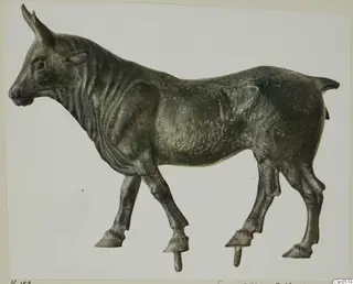 Bronze statuette of a standing bull in profile facing left, from Vouni