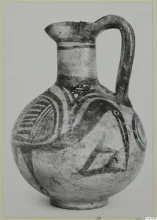 Pottery Bichrome IV jug with a single handle and dark painted bands and motifs on a pale body