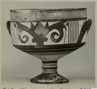Pottery Bichrome IV footed bowl with two side handles and dark painted spirals and bands