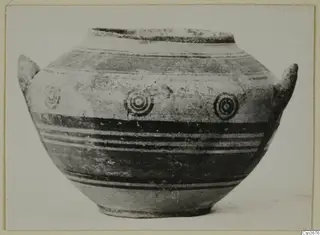 Bichrome IV jug with two handles, banded decoration and concentric-circle motifs