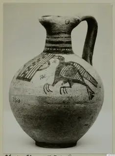 Bichrome IV jug with a painted bird on its body and horizontal bands on the neck