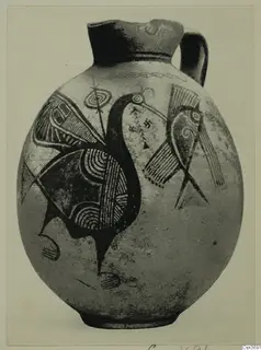 Globular jug with a tall neck and strap handle, decorated with two large painted birds, from Pottery Bichrome IV plate