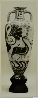 Two-handled vessel with painted spirals, a long-necked bird and wavy bands, standing on a dark stand.