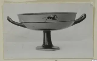 Stemmed bowl with two horizontal handles, its side decorated with a painted horse and rider