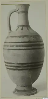 Pottery jug with dark painted bands and a single handle, from Vouni.