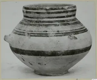 Pottery Bichrome V amphoriskos from Marion, with dark painted horizontal bands and a small lug