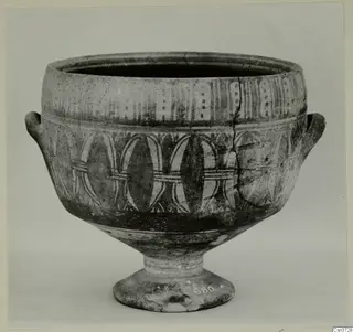 Pottery Bichrome V: footed bowl with two handles and painted bands of arches and vertical strokes