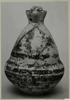 Pottery Bichrome V, a pear-shaped vessel with a narrow neck and dark painted bands