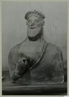 Bust of a bearded man with a wreath on his head and one hand raised to the chest, from Mersinaki