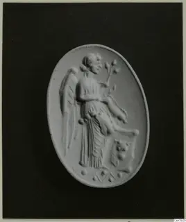 Oval relief of a winged figure holding a branch, pale against a dark backdrop.