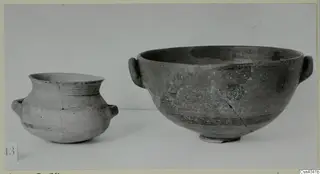 Two pottery vessels from Amathus: a small two-handled jar and a larger deep bowl with handles