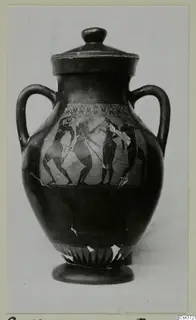 Lidded two-handled jar with black-figure scenes of four figures on its body, shown against a pale backdrop