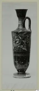 Tall pottery vessel with a flared mouth, one loop handle and painted figures, photographed on a mounted card