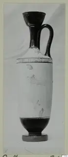 White-ground pottery vessel with a black neck and handle and a key pattern band at the shoulder