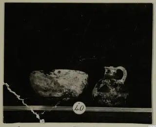 Bowl and painted juglet on a ledge, from Lapithos Markides T. 40