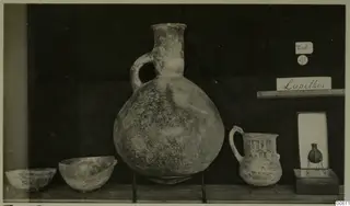 Jugs and bowls from Lapithos Markides, T.201B, set out on a display shelf
