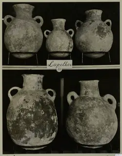 Five two-handled jugs with rounded bodies and long necks, shown in two rows, from Lapithos Markides Tomb 50.