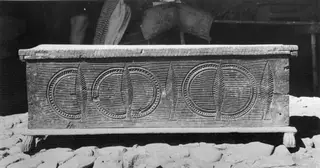 Cypriot clothes chest, so-called sendudzin, with carved circles and leaf-like motifs on its front.