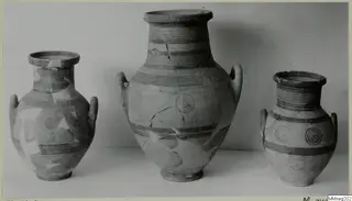 Three painted two-handled jars from Marion, shown side by side against a plain background