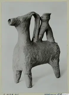 Clay vessel shaped like a four-legged animal, with a tall arched handle and a small spout rising from its back