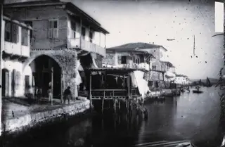 Larnaca: houses and a timber platform over the sea, 1981 contact print