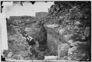Paphos: the masonry wall of a tomb in a trench, 1981 contact print