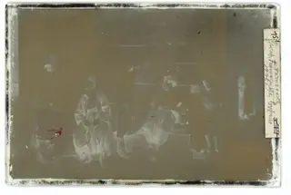 Nicosia: a group of men by a column and a stone wall, The glass negative
