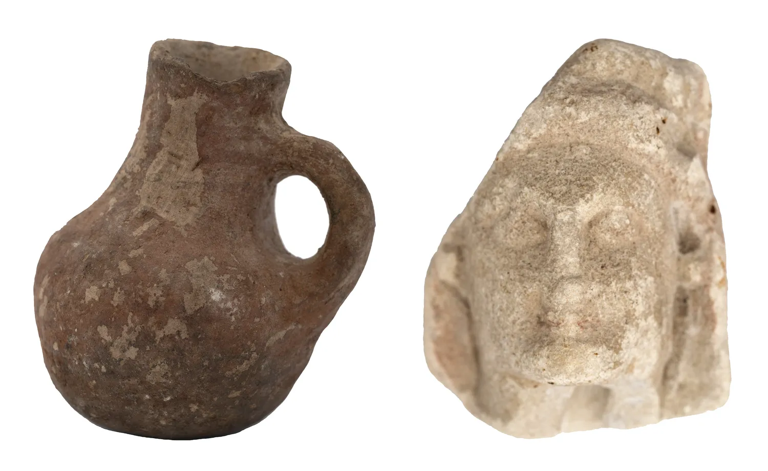 The two antiquities WO1 Thomas Shaw Anderson bought from the Cyprus Museum in 1941: a small round-bodied Bronze Age juglet with one handle, and the worn face from an Iron Age figurine. RD Milns Antiquities Museum, UQ 24.001 and 24.002. Photo: Carl Warner, CC BY-NC-SA 4.0.