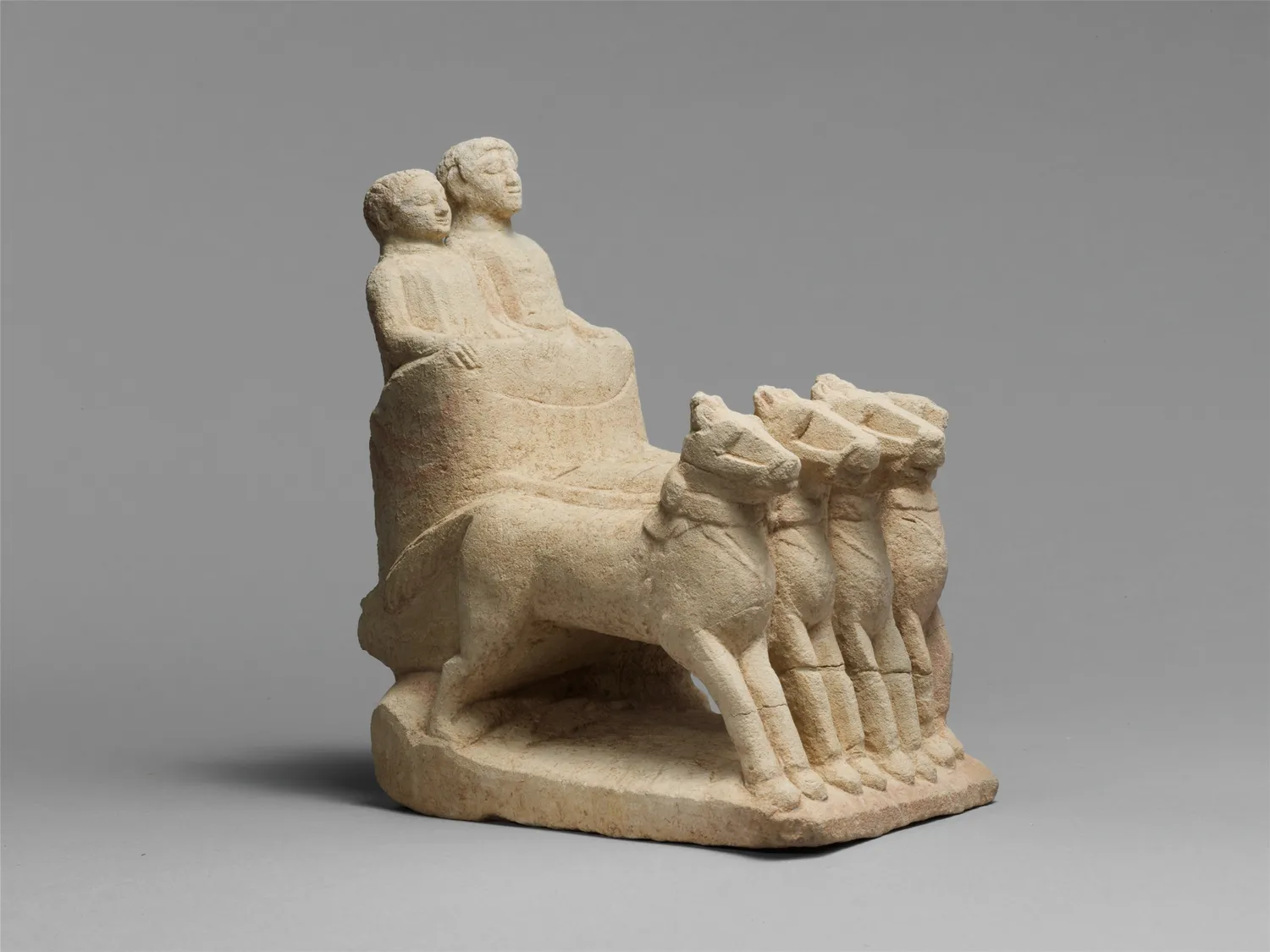 Limestone model of a four-horse chariot carrying two figures, Cyprus, 7th–6th century BC: the kind of team that was buried with its bronze harness in the tombs of Salamis. Metropolitan Museum of Art, 74.51.2845.