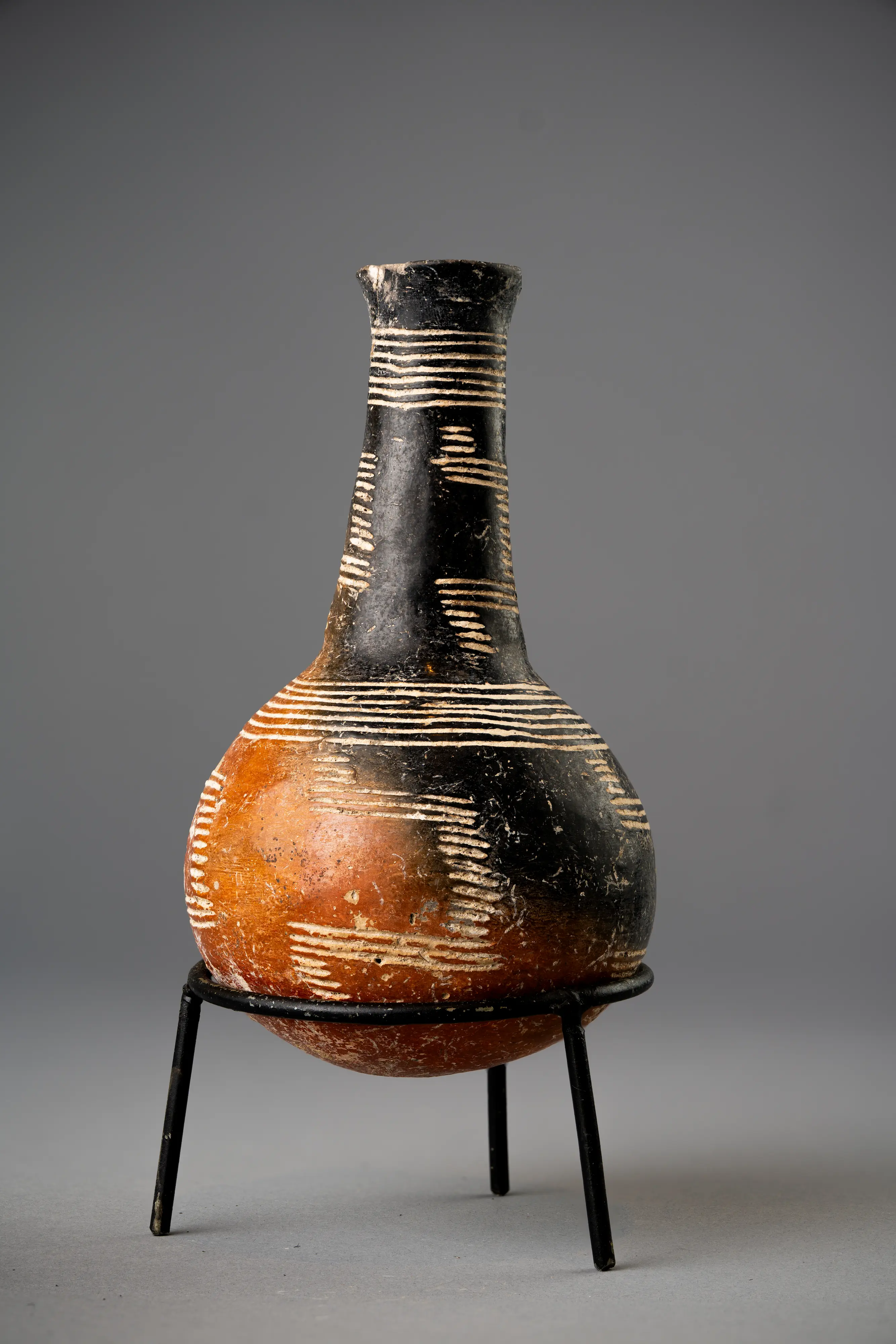 Early Bronze Age Cypriot Red Slip Jug, Incised with patterns, mottled appearance, from the Drakopoulos collection, 2300 - 1800 BCE