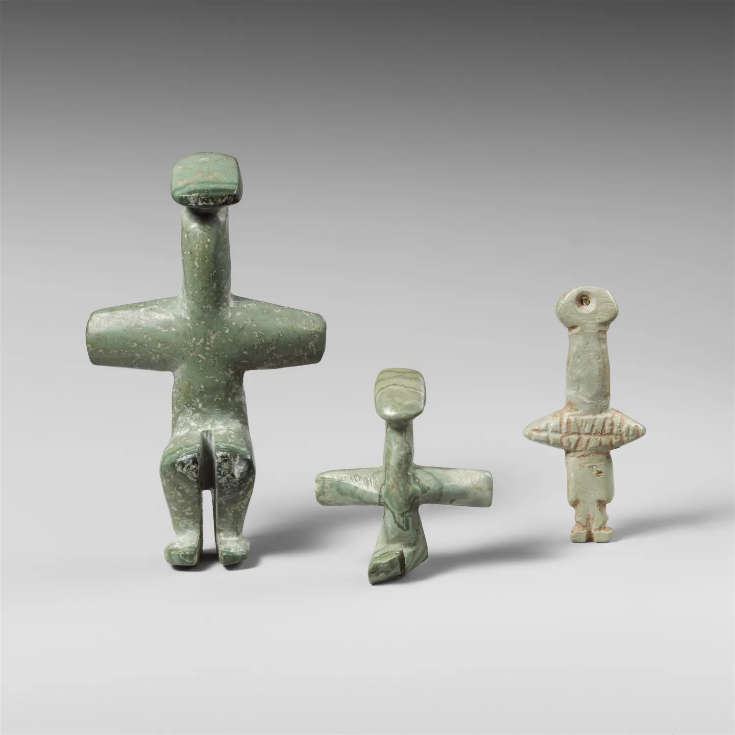 Three Chalcolithic picrolite figures from Cyprus, fourth to third millennium BC. The Metropolitan Museum bought two such figures from Koutoulakis in 1951.