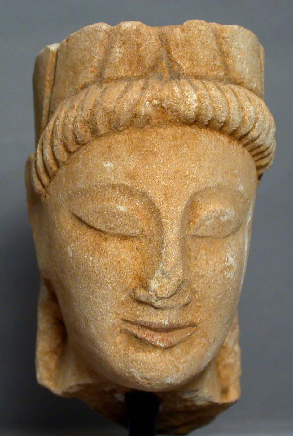 Limestone head of a wreathed youth, Cypriot, sixth century BC: from the de Clercq collection, held by Koutoulakis until 1979, and bequeathed to the Metropolitan Museum by Nanette Kelekian in 2020.