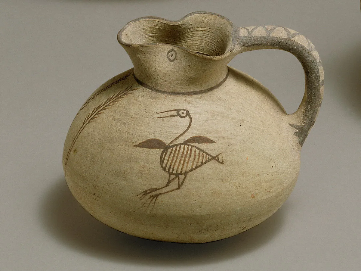 A Cypro-Archaic juglet painted with a single long-necked bird in the open 'free-field' style, the manner of the Pierides jugs. Metropolitan Museum, New York.