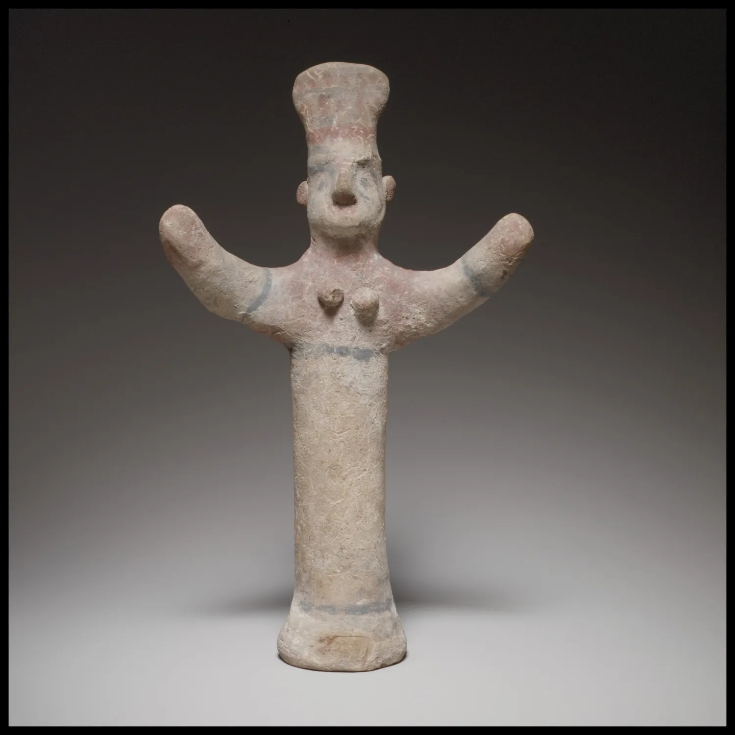 A terracotta 'goddess with uplifted arms,' one of the figurine types Karageorghis counted among the Aegean traits that reached Cyprus in the eleventh century. Metropolitan Museum of Art, New York (Cesnola Collection).