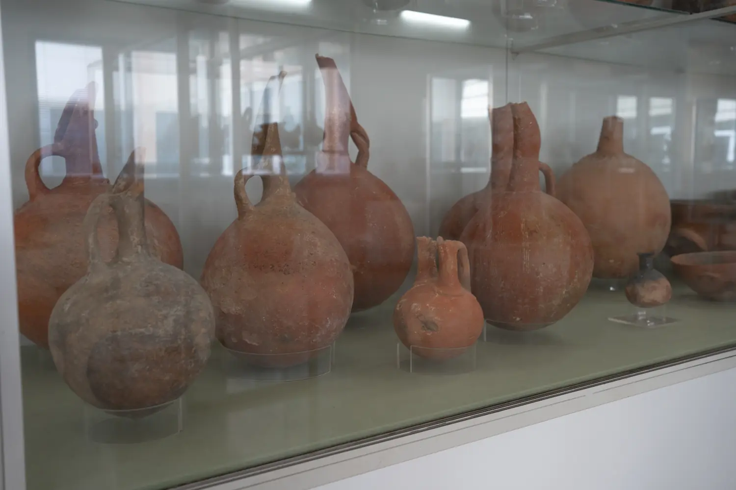 Figure 2. Bronze Age Jugs Display Highlighting Reflective Museum Glass