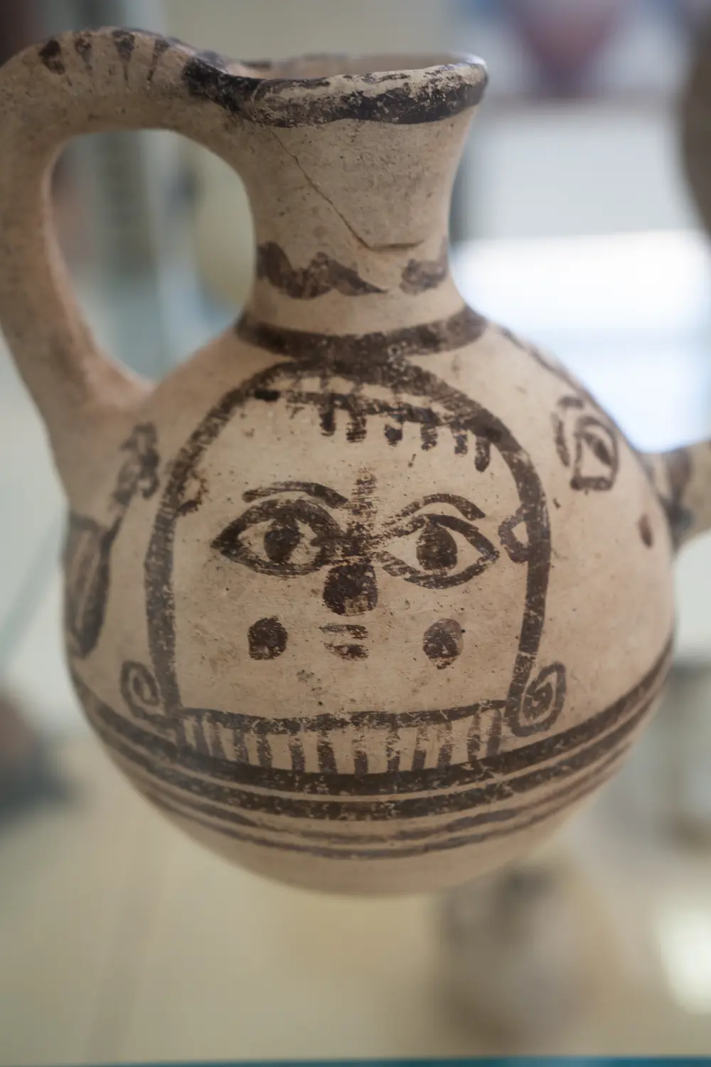 Figure 25. Fascinating Cypro-Archaic White Painted Free Field Face of a Woman on small Oinochoe