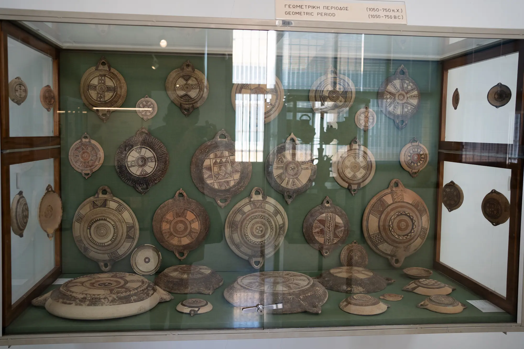 Figure 18. Cypro-Geometric Bichrome Dish Display Case