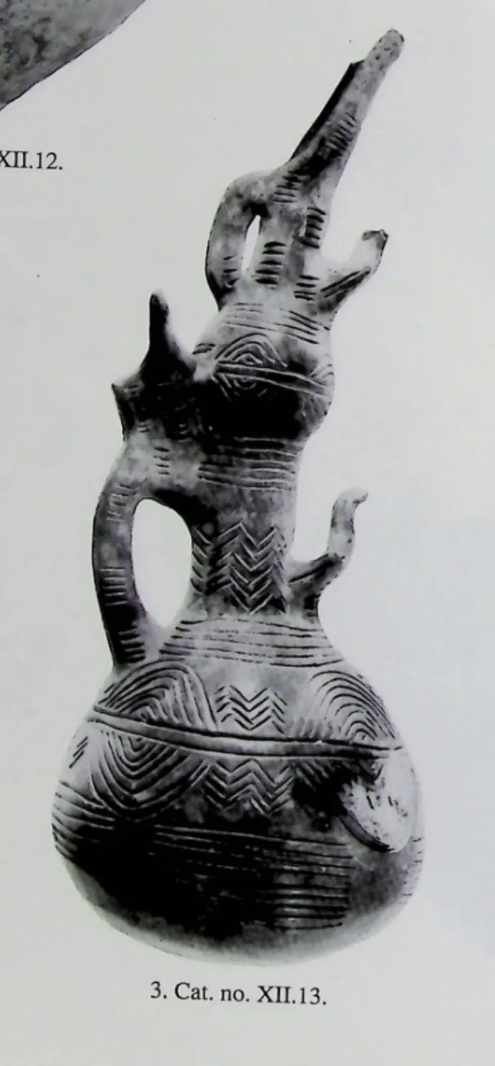 A composite jug in the Cyprus Museum, Karageorghis's cat. XII.13: two jug-bodies built into a single vessel, hung with small modelled birds and arched by a basket handle, in a black-and-white plate from The Coroplastic Art of Ancient Cyprus.