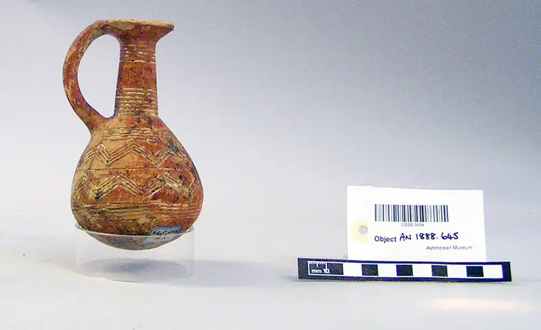Red Polished pear-shaped juglet, long neck, Early Bronze Age III Cypriot