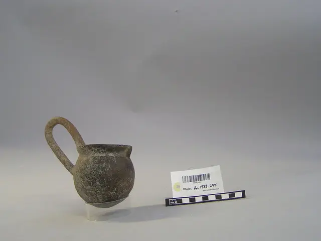 Red Polished III high handled spouted dipper, Middle Bronze Age I Cypriot