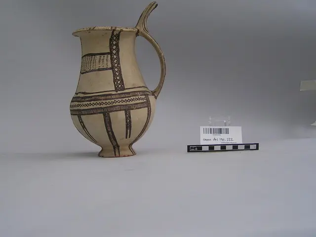 White Slip II tankard with double-horned handle