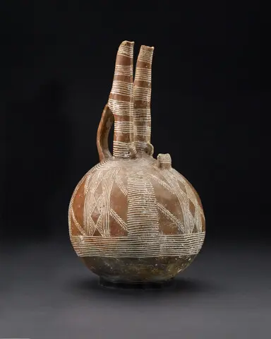 Double necked Red Polished jug with bulbous body, Early Bronze Age III Cypriot