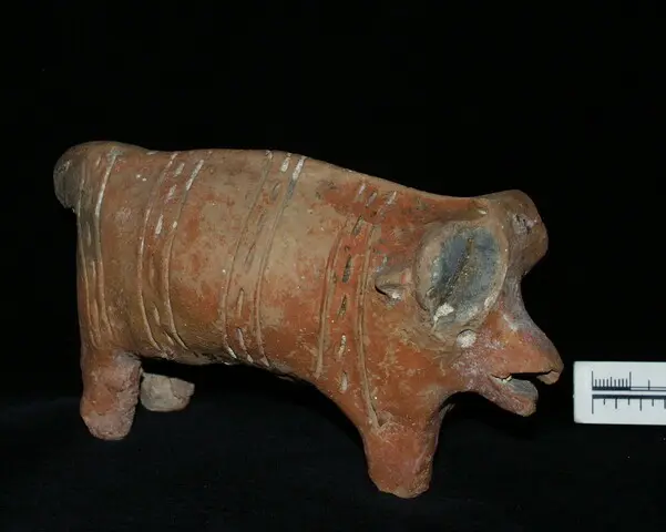 Red Polished terracotta figurine in the shape of a bull, Middle Bronze Age I Cypriot statue