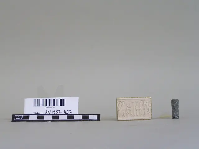 Cylinder seal depicting a stylized tree framed by two climbing goats and a long-robed human figure, Late Bronze Age II Cypriot