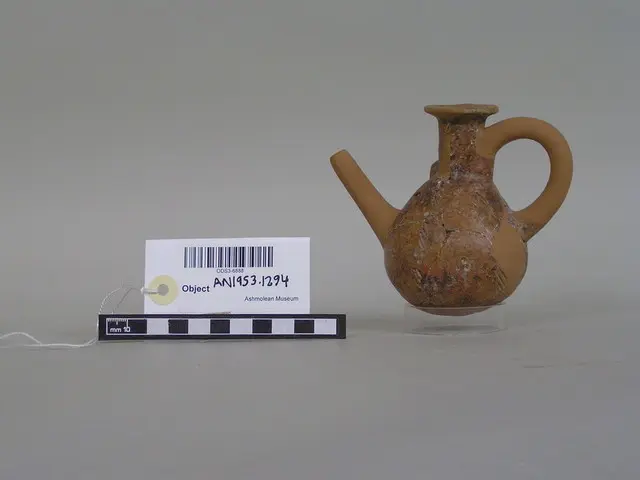 Red Polished juglet, restored, Middle Bronze Age I Cypriot